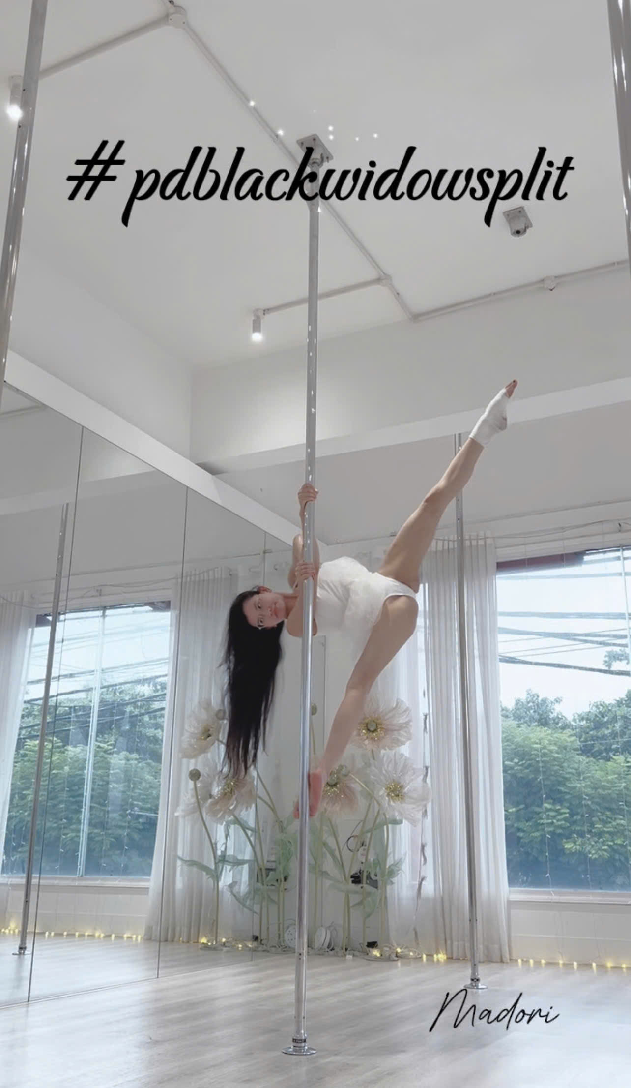 Black widow split pole pose